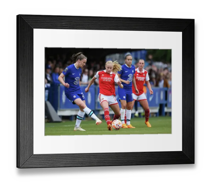 Framed Print : Kathrine Kuhl vs. Niamh Charles: Intense Battle in Chelsea Women vs. Arsenal Women's Super League Match