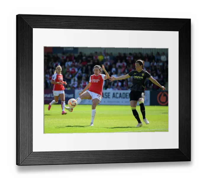 Framed Print : Intense Shooting Showdown: Arsenal vs. Aston Villa in FA Women's Super League