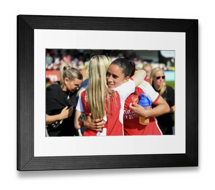 Framed Print : A Moment of Triumph: Leah Williamson and Rafaelle Souza's Embrace - Arsenal Women Celebrate FA WSL Title (2022-23)