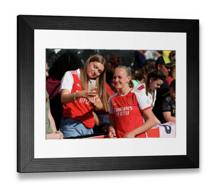 Framed Print : Arsenal Women Celebrate with Fans After Victory Over Aston Villa in FA WSL