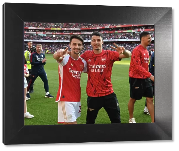 Arsenal's Fabio Vieira and Gabriel Martinelli Celebrate Victory Over Wolverhampton Wanderers in 2022-23 Premier League