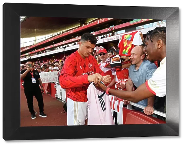 Arsenal's Granit Xhaka Signs Autographs After Arsenal v Wolverhampton Wanderers Match, 2022-23 Season