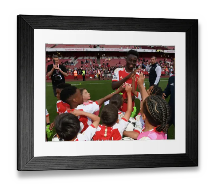 Framed Print : Arsenal's Bukayo Saka Greets Academy Players after Arsenal vs. Wolverhampton Wanderers (2022-23)