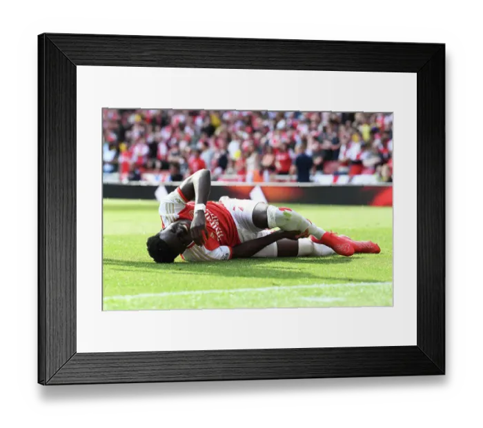 Framed Print : Arsenal's Bukayo Saka Injured in Intense Arsenal v Wolverhampton Wanderers Clash (2022-23) Framed Print : Arsenal's Bukayo Saka Injured in Intense Arsenal v Wolverhampton Wanderers Clash (2022-23)