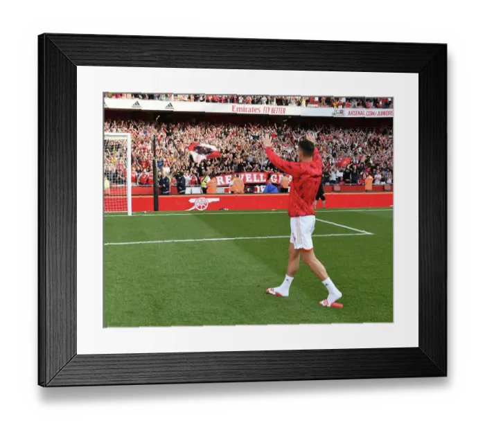 Framed Print : Arsenal's Granit Xhaka Celebrates with Fans after Securing Premier League Victory over Wolverhampton Wanderers Framed Print : Arsenal's Granit Xhaka Celebrates with Fans after Securing Premier League Victory over Wolverhampton Wanderers