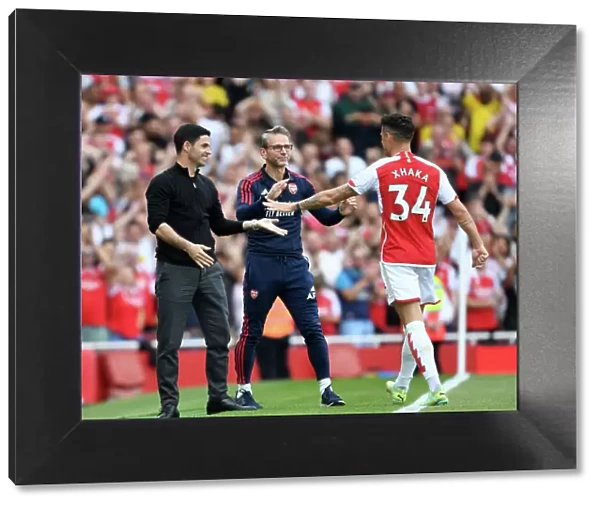 Arsenal's Xhaka Scores and Celebrates with Arteta vs. Wolverhampton Wanderers (2022-23)