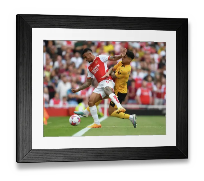 Framed Print : Intense Arsenal vs. Wolverhampton Wanderers Clash: Gabriel Jesus and Joao Gomes Battle it Out in the Premier League (2022-23)