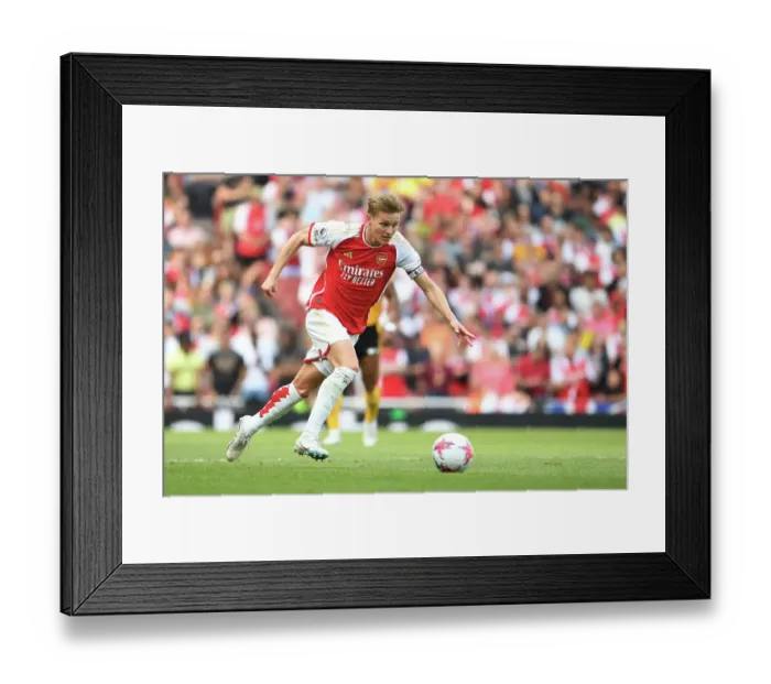 Framed Print : Arsenal's Martin Odegaard Charges Forward Against Wolverhampton Wanderers in 2022-23 Premier League Clash Framed Print : Arsenal's Martin Odegaard Charges Forward Against Wolverhampton Wanderers in 2022-23 Premier League Clash