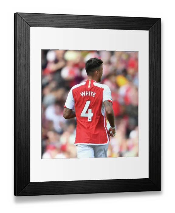 Framed Print : Arsenal's Ben White Stands Firm in Intense 2022-23 Premier League Showdown vs. Wolverhampton Wanderers Framed Print : Arsenal's Ben White Stands Firm in Intense 2022-23 Premier League Showdown vs. Wolverhampton Wanderers