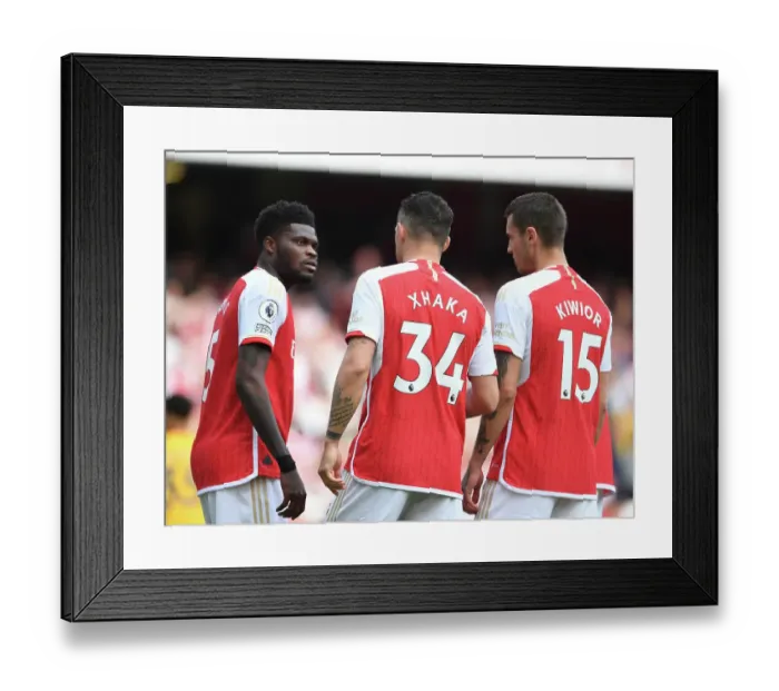 Framed Print : Arsenal's Midfield Trio: Partey, Xhaka, and Kiwior in Action against Wolverhampton Wanderers (2022-23) Framed Print : Arsenal's Midfield Trio: Partey, Xhaka, and Kiwior in Action against Wolverhampton Wanderers (2022-23)