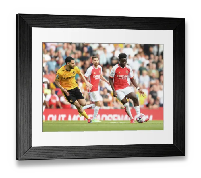 Framed Print : Saka in Action: Arsenal vs. Wolverhampton Wanderers, 2022-23 Premier League