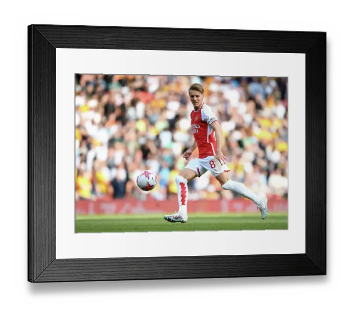 Framed Print : Charging Ahead: Martin Odegaard Leads Arsenal Past Wolverhampton Wanderers in the 2022-23 Premier League