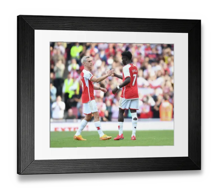 Framed Print : Arsenal's Trossard and Saka in Action against Wolverhampton Wanderers (2022-23)