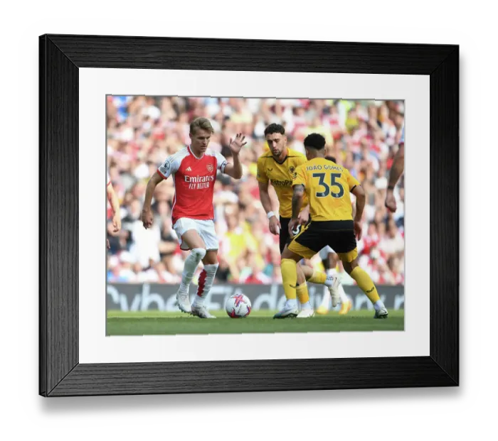 Framed Print : Martin Odegaard's Brilliant Performance: Arsenal Triumphs Over Wolverhampton Wanderers (2022-23) Framed Print : Martin Odegaard's Brilliant Performance: Arsenal Triumphs Over Wolverhampton Wanderers (2022-23)