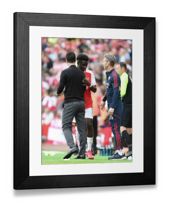 Framed Print : Arsenal's Bukayo Saka Interacts with Mikel Arteta after Substitution vs. Wolverhampton Wanderers (2022-23) Framed Print : Arsenal's Bukayo Saka Interacts with Mikel Arteta after Substitution vs. Wolverhampton Wanderers (2022-23)