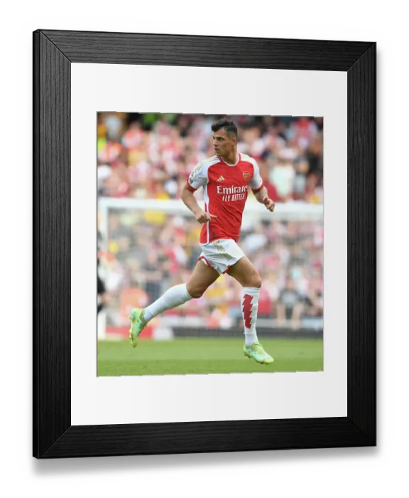 Framed Print : Granit Xhaka's Standout Midfield Display: Arsenal's Victory over Wolverhampton Wanderers