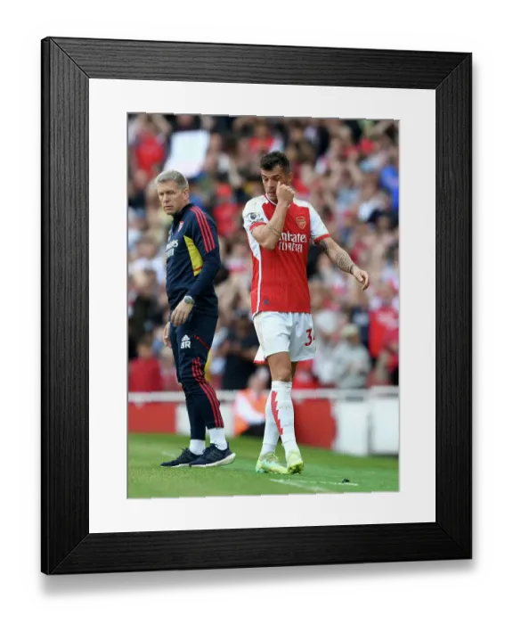 Framed Print : Arsenal's Xhaka Reacts to Substitution in Arsenal v Wolverhampton Wanderers (2022-23)