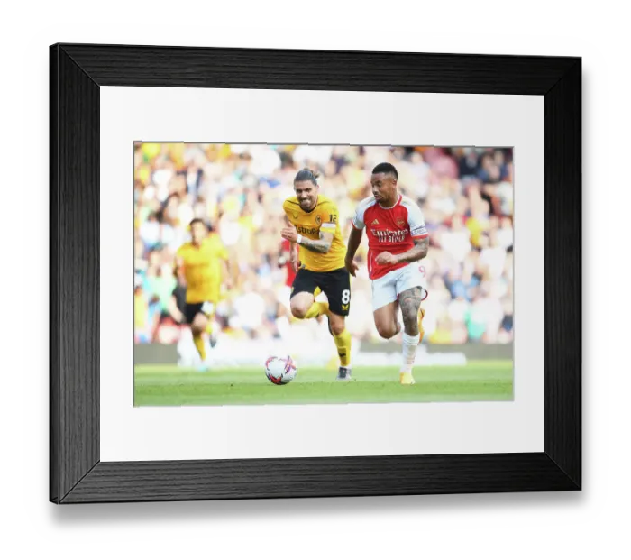 Framed Print : Arsenal's Gabriel Jesus Outruns Neves in Thrilling Arsenal vs. Wolverhampton Wanderers Clash (2022-23)