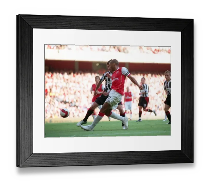 Framed Print : Thierry Henry (Arsenal) crosses the ball leading to Phil Jagielkas own goal