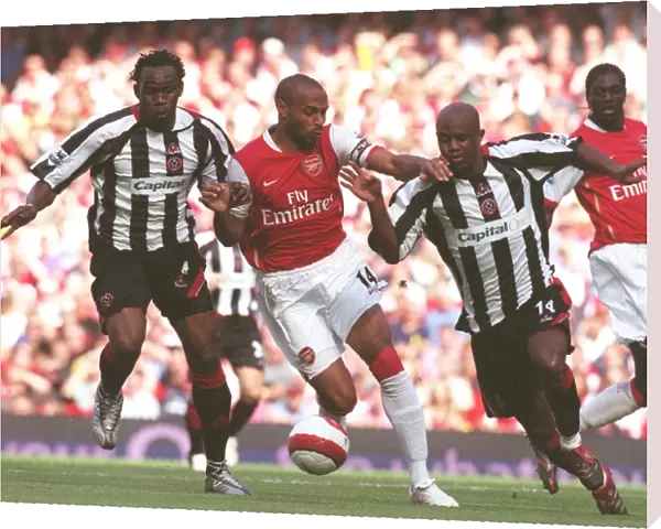 Thierry Henry (Arsenal) Claude Davis and David Sommeil (Sheff Utd)