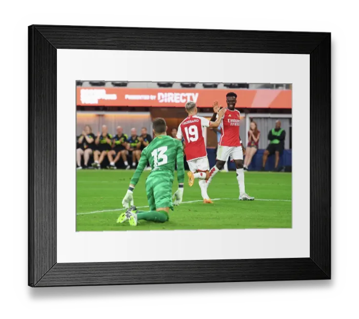 Framed Print : Arsenal's Pre-Season Victory: Trossard and Saka Celebrate Four Goals Against FC Barcelona (2023) Framed Print : Arsenal's Pre-Season Victory: Trossard and Saka Celebrate Four Goals Against FC Barcelona (2023)