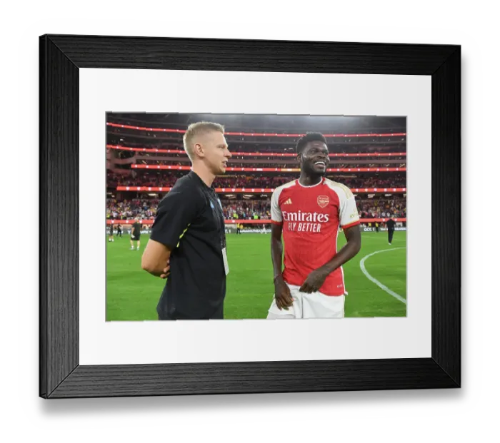 Framed Print : Arsenal and FC Barcelona: A Pre-Season Rivalry - Arsenal's Zinchenko and Partey Connect Amidst Intense Training in Inglewood, California (2023) Framed Print : Arsenal and FC Barcelona: A Pre-Season Rivalry - Arsenal's Zinchenko and Partey Connect Amidst Intense Training in Inglewood, California (2023)