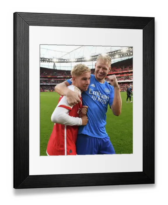 Framed Print : Arsenal's Exuberant Post-Match Celebration: Emile Smith Rowe and Aaron Ramsdale at Emirates Cup 2023-24