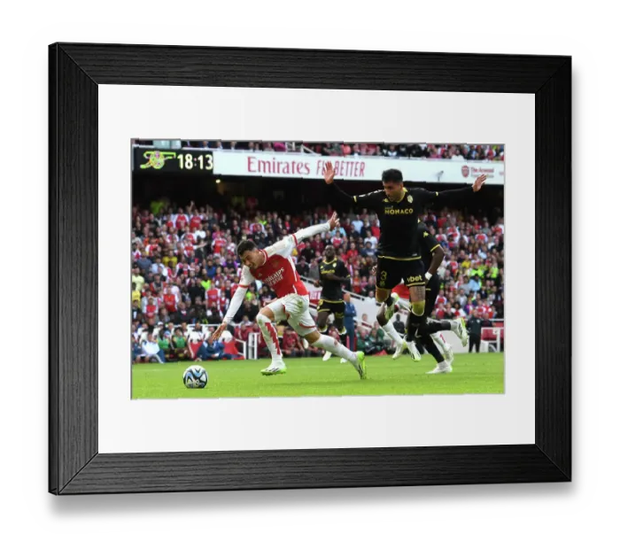 Framed Print : Arsenal's Martinelli Faces Off Against Monaco's Maripan in Emirates Cup Clash