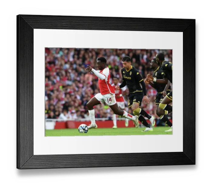 Framed Print : Arsenal's Nketiah Faces Off Against Monaco's Maripan in 2023-24 Emirates Cup Clash Framed Print : Arsenal's Nketiah Faces Off Against Monaco's Maripan in 2023-24 Emirates Cup Clash