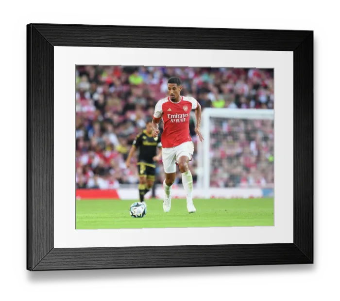 Framed Print : Arsenal's William Saliba Takes on AS Monaco in 2023-24 Emirates Cup Showdown Framed Print : Arsenal's William Saliba Takes on AS Monaco in 2023-24 Emirates Cup Showdown