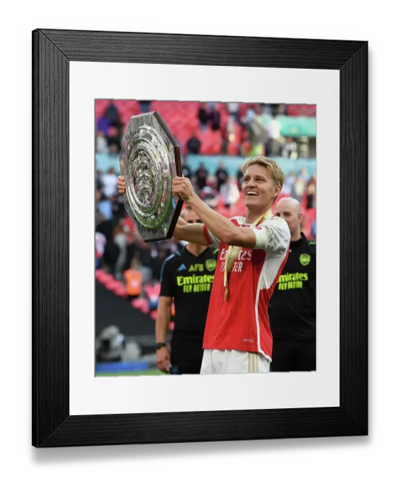 Framed Print : Arsenal: Martin Odegaard Lifts the Community Shield (2023-24) Framed Print : Arsenal: Martin Odegaard Lifts the Community Shield (2023-24)
