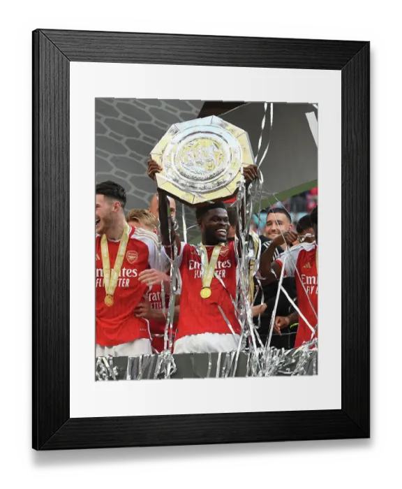 Framed Print : Thomas Partey Lifts the Community Shield: Arsenal Celebrate Victory over Manchester City (2023-24)