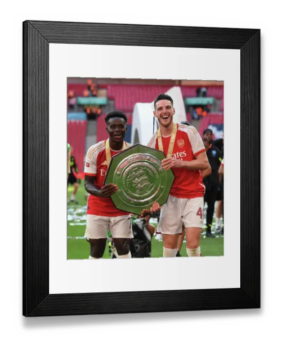 Framed Print : Arsenal: Bukayo Saka and Declan Rice Lift the Community Shield Trophy Framed Print : Arsenal: Bukayo Saka and Declan Rice Lift the Community Shield Trophy