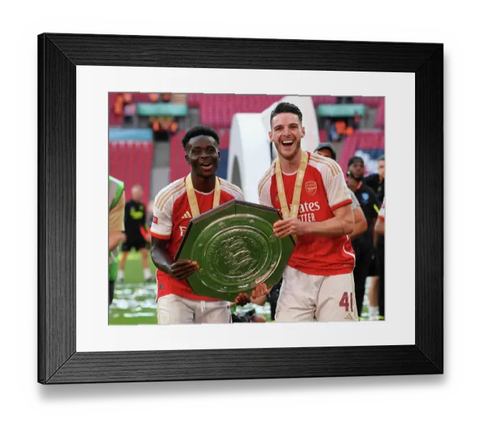 Framed Print : Arsenal's Bukayo Saka and Declan Rice Celebrate FA Community Shield Victory over Manchester City