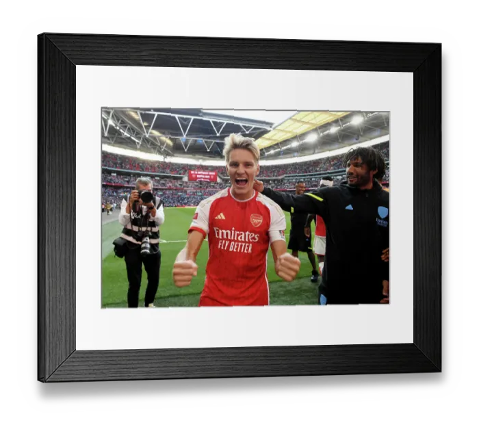 Framed Print : Martin Odegaard's Triumph: Arsenal Celebrate Community Shield Victory over Manchester City (2023-24)