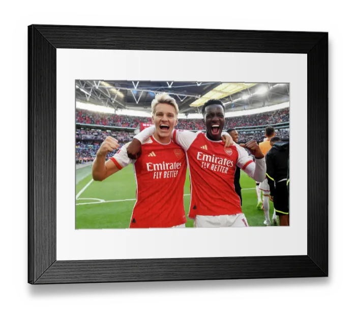 Framed Print : Arsenal Celebrate Community Shield Victory over Manchester City (2023-24): Martin Odegaard and Edward Nketiah Rejoice in Glory Framed Print : Arsenal Celebrate Community Shield Victory over Manchester City (2023-24): Martin Odegaard and Edward Nketiah Rejoice in Glory