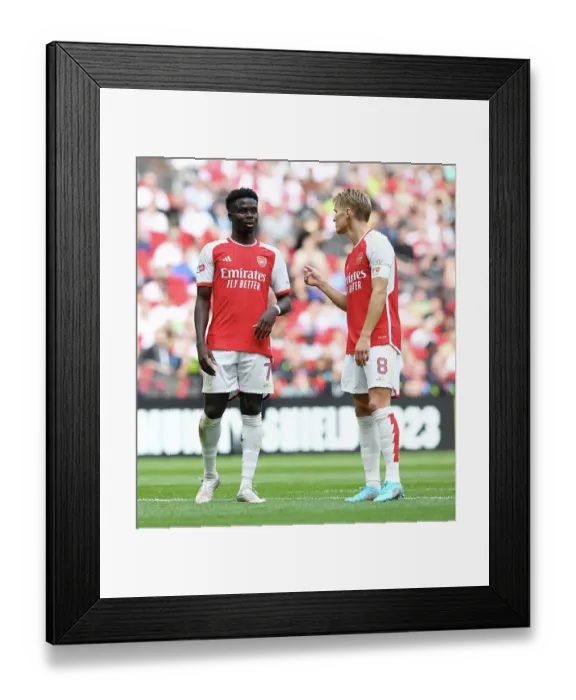 Framed Print : Arsenal's Saka and Odegaard Connect Amidst Community Shield Rivalry: Manchester City vs Arsenal (2023-24) Framed Print : Arsenal's Saka and Odegaard Connect Amidst Community Shield Rivalry: Manchester City vs Arsenal (2023-24)