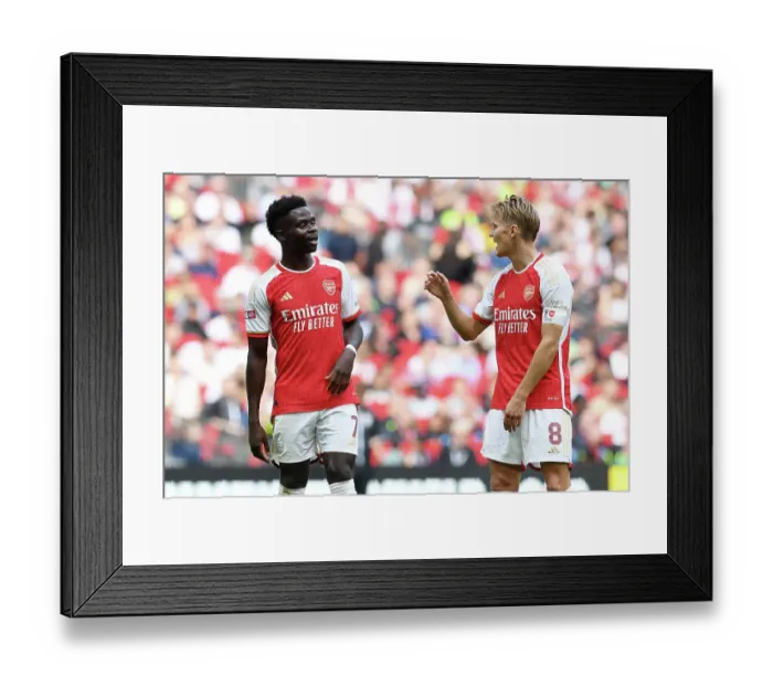 Framed Print : Arsenal's Bukayo Saka and Martin Odegaard Interact During FA Community Shield Match vs Manchester City (2023-24) Framed Print : Arsenal's Bukayo Saka and Martin Odegaard Interact During FA Community Shield Match vs Manchester City (2023-24)