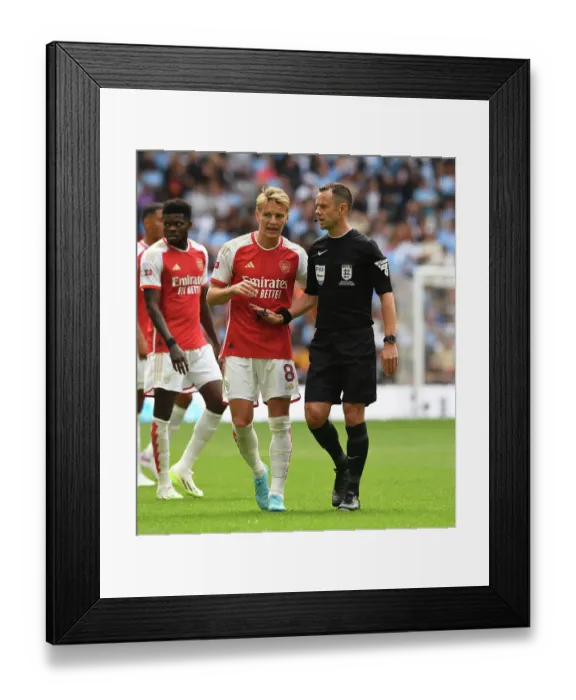Framed Print : Arsenal's Odegaard Discusses Calls with Referee during FA Community Shield Clash vs Manchester City (2023-24) Framed Print : Arsenal's Odegaard Discusses Calls with Referee during FA Community Shield Clash vs Manchester City (2023-24)