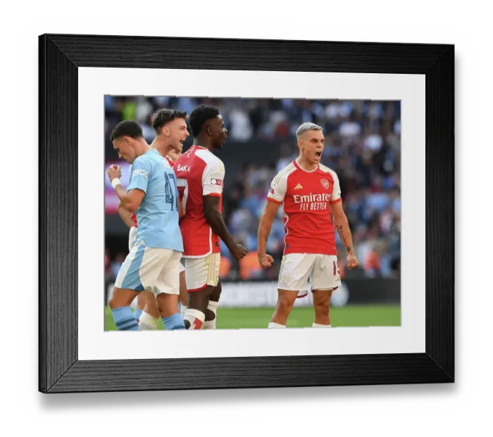 Framed Print : Arsenal Claim Community Shield Victory: Leandro Trossard Scores Thrilling Goal Against Manchester City Framed Print : Arsenal Claim Community Shield Victory: Leandro Trossard Scores Thrilling Goal Against Manchester City