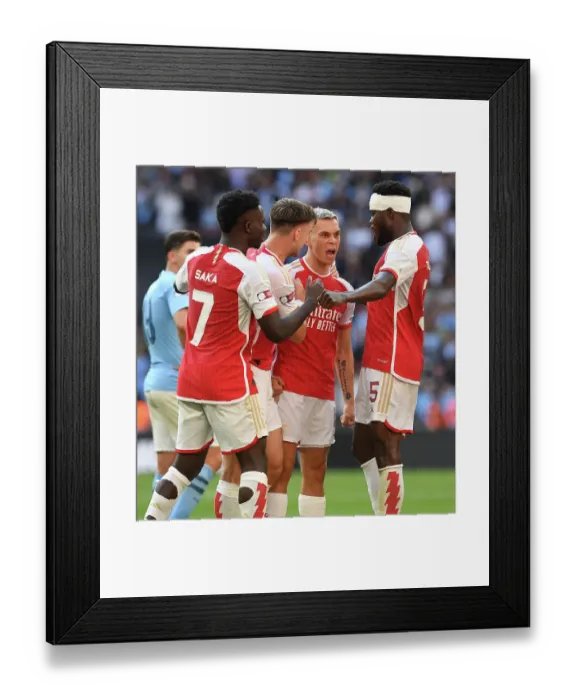 Framed Print : Arsenal's Stars: Trossard, Saka, Tierney, Partey Celebrate Goal Against Manchester City - FA Community Shield 2023-24