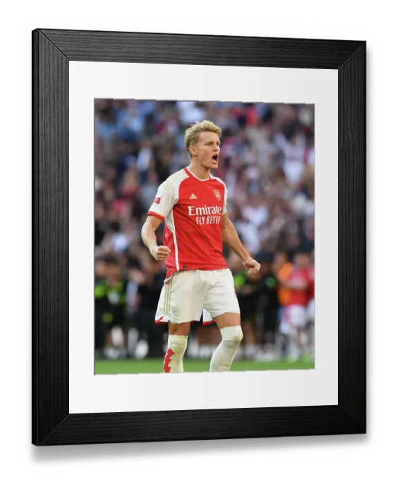 Framed Print : Arsenal's Martin Odegaard Scores Decisive Penalty in FA Community Shield Thriller: Arsenal Triumph Over Manchester City Framed Print : Arsenal's Martin Odegaard Scores Decisive Penalty in FA Community Shield Thriller: Arsenal Triumph Over Manchester City