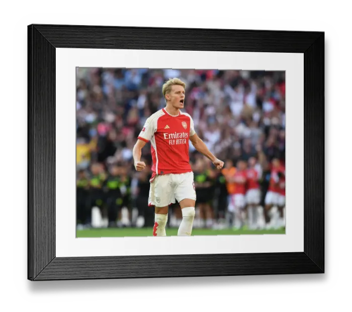 Framed Print : Arsenal's Martin Odegaard Celebrates Penalty Goal in FA Community Shield Showdown vs Manchester City (2023-24) Framed Print : Arsenal's Martin Odegaard Celebrates Penalty Goal in FA Community Shield Showdown vs Manchester City (2023-24)