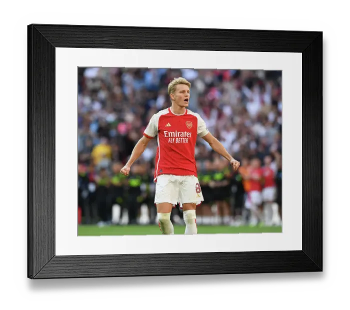 Framed Print : Arsenal's Martin Odegaard Celebrates Penalty Win in FA Community Shield Thriller: Arsenal vs Manchester City (2023-24) Framed Print : Arsenal's Martin Odegaard Celebrates Penalty Win in FA Community Shield Thriller: Arsenal vs Manchester City (2023-24)