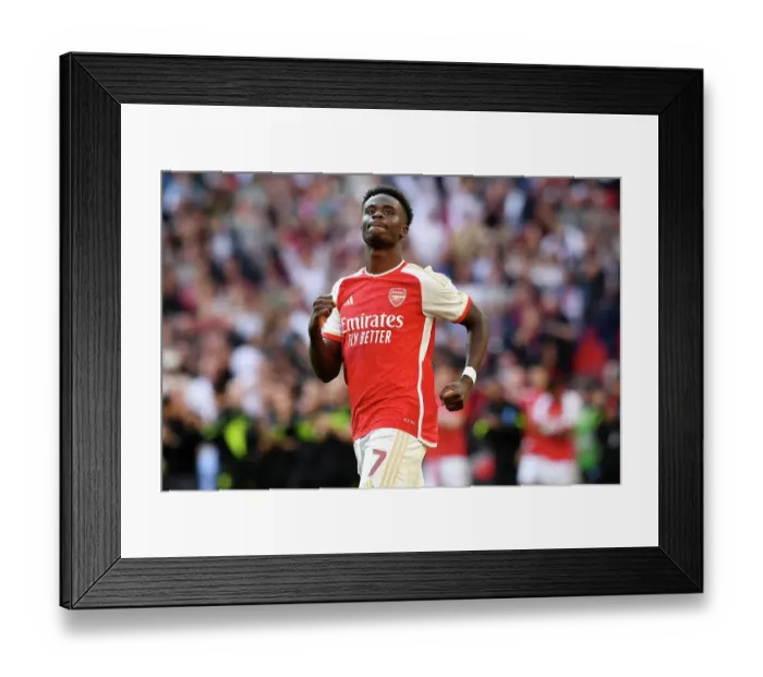 Framed Print : Arsenal's Bukayo Saka Scores the Winning Goal: Arsenal Celebrate Community Shield Victory over Manchester City (2023-24) Framed Print : Arsenal's Bukayo Saka Scores the Winning Goal: Arsenal Celebrate Community Shield Victory over Manchester City (2023-24)