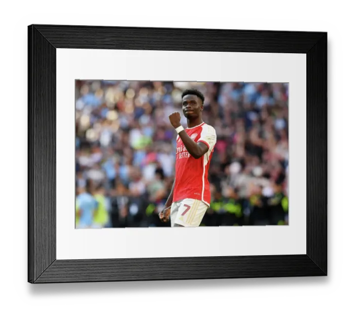 Framed Print : Bukayo Saka's Triumphant Celebration: Arsenal Claim Community Shield Victory over Manchester City Framed Print : Bukayo Saka's Triumphant Celebration: Arsenal Claim Community Shield Victory over Manchester City