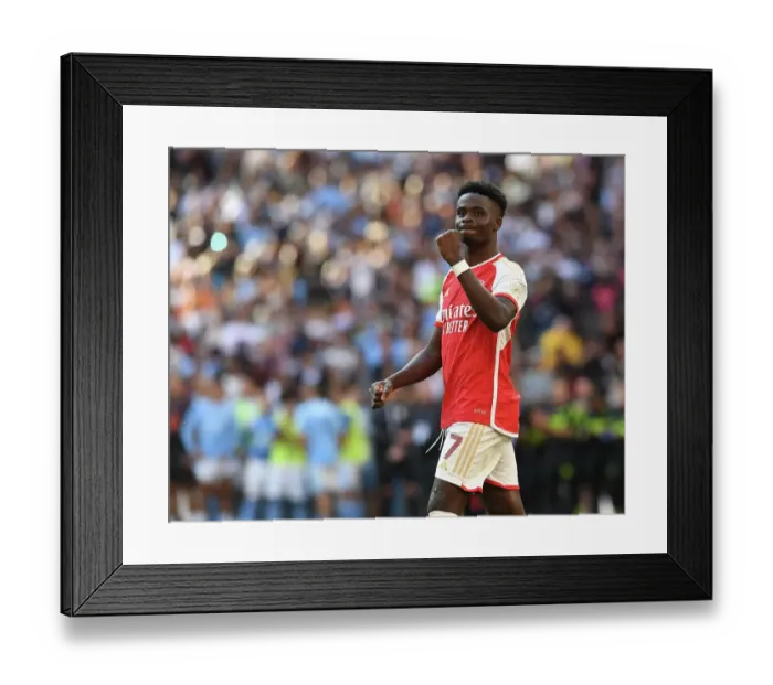 Framed Print : Bukayo Saka's Dramatic Penalty: Arsenal Secure Community Shield Victory over Manchester City