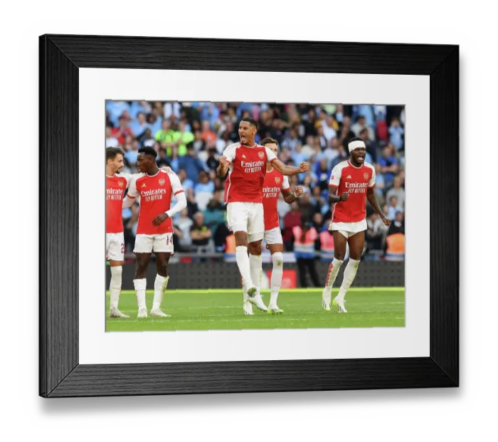 Framed Print : Arsenal Celebrate Community Shield Victory: Arsenal Players, Including William Saliba, Rejoice after Defeating Manchester City (2023-24) Framed Print : Arsenal Celebrate Community Shield Victory: Arsenal Players, Including William Saliba, Rejoice after Defeating Manchester City (2023-24)