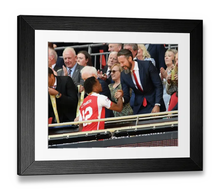Framed Print : Arsenal's Josh Kroenke and Jurrien Timber Celebrate Community Shield Victory over Manchester City