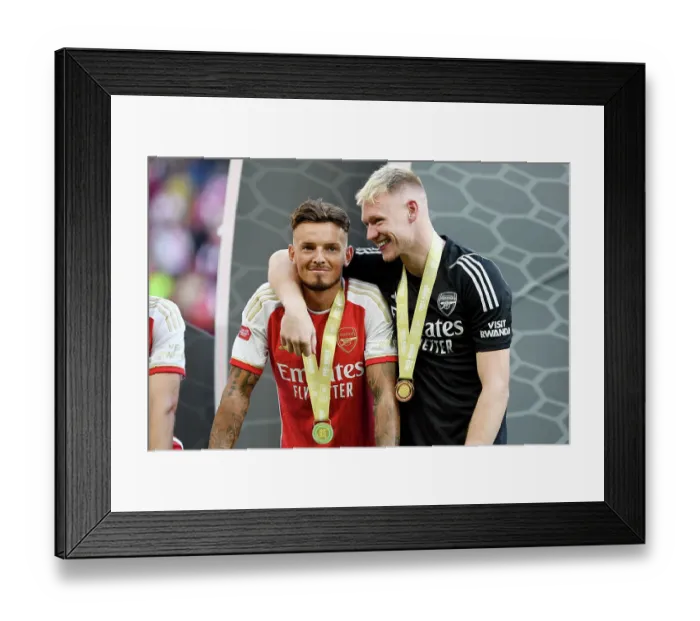 Framed Print : Arsenal's Ben White and Aaron Ramsdale Celebrate Penalty Shootout Victory in Community Shield Final (2023-24): Overcoming Manchester City at Wembley